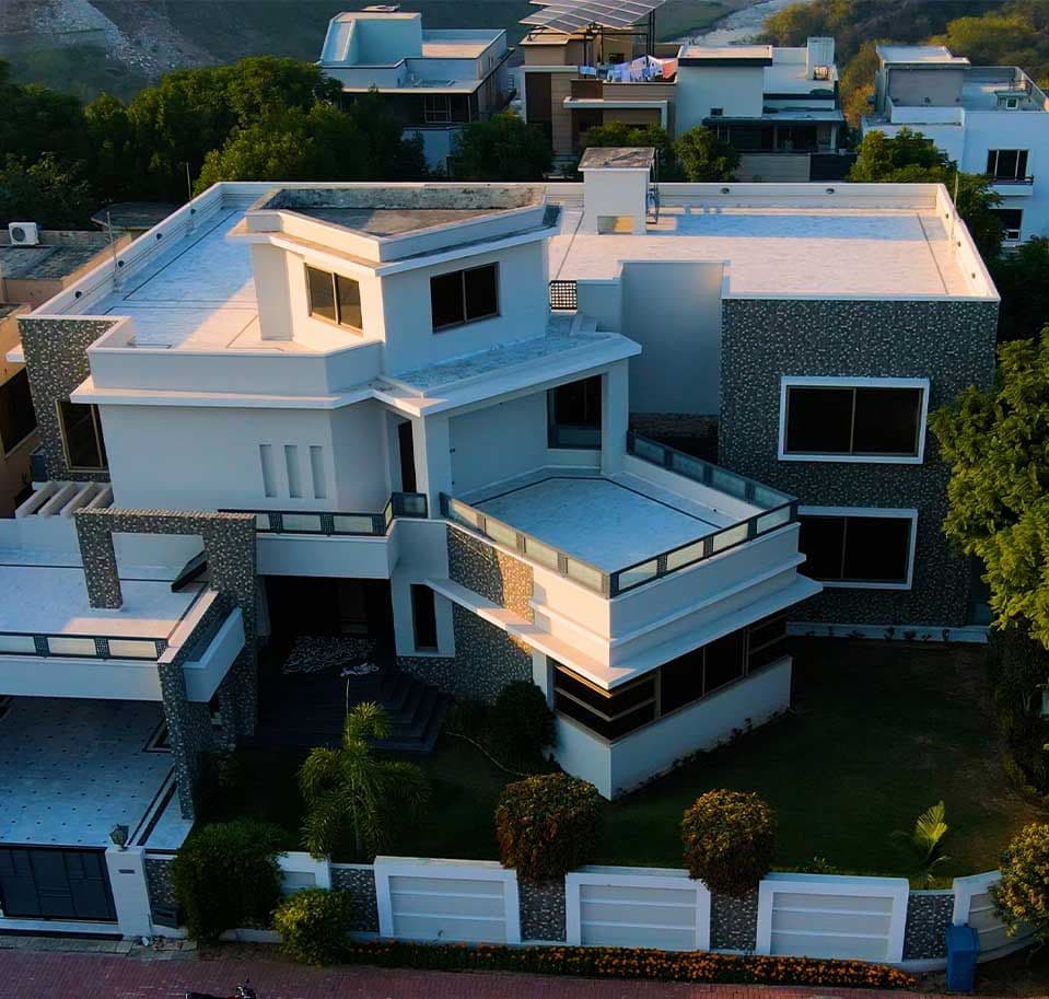 Aerial view of a completed home in its neighbourhood